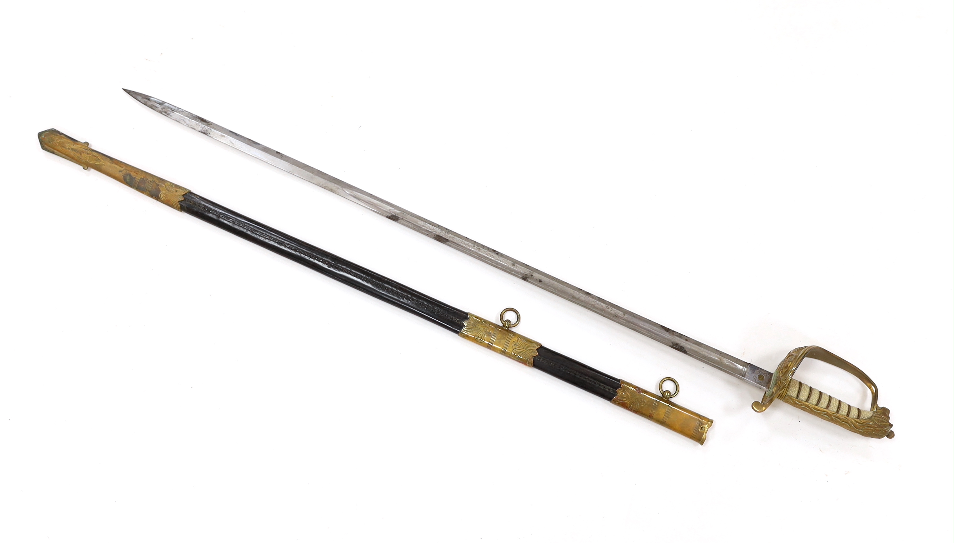 A George V naval officer’s sword, maker Grieves, in a leather scabbard, guard engraved G.P. Bewley, blade 79.5cm, together with outer leather cover